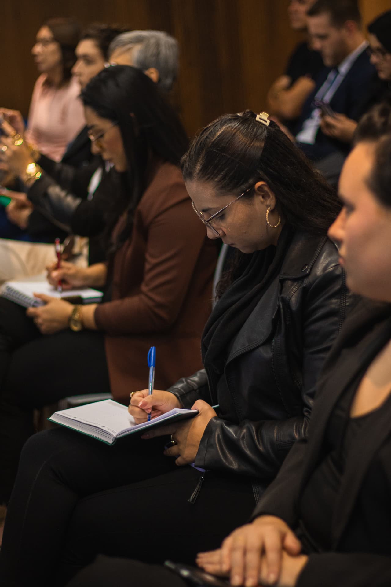 Participantes registrando os aprendizados do workshop